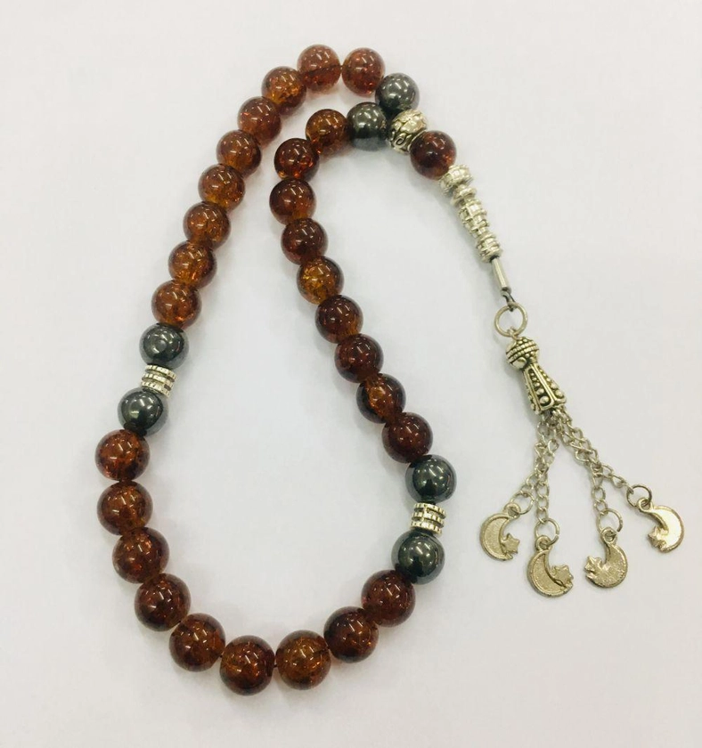 سبحة تراب كهرمان مطعمة بأحجار الهيماتيت الطبيعية