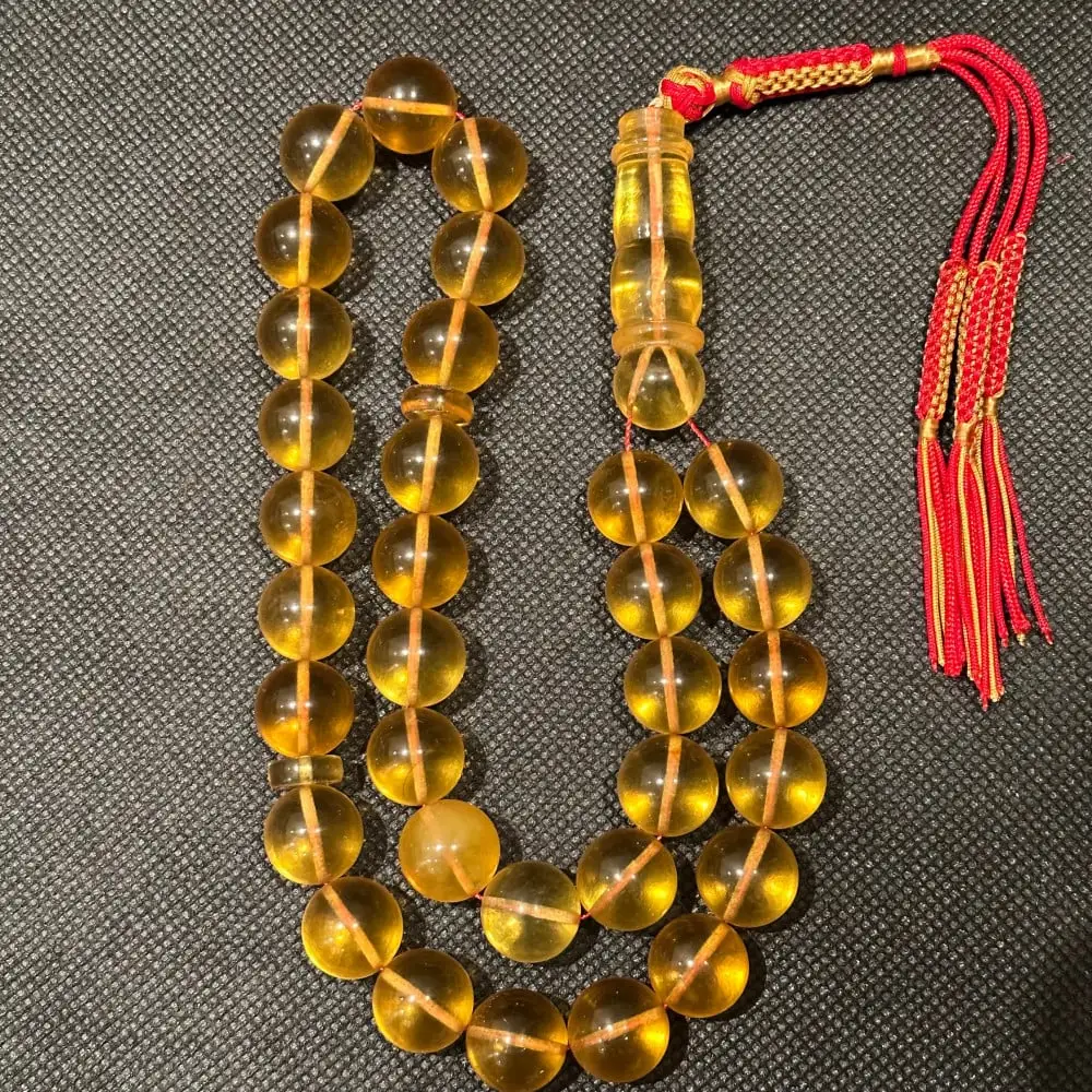 سبحة كهرمان كلنقرادي شفاف عسلي طبيعي فرز