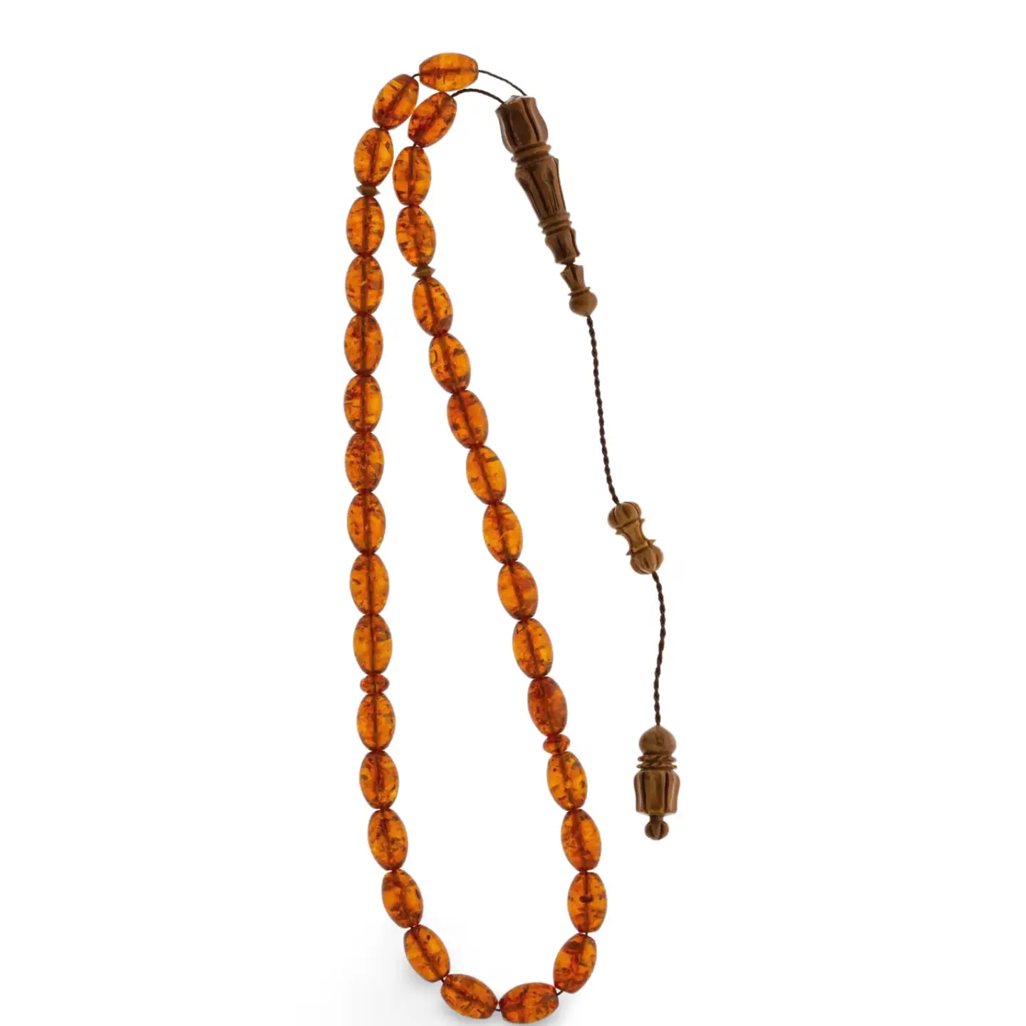 ادينى صورة ل سبحة من الكهرمان الروسي و ثمرة الكوك 