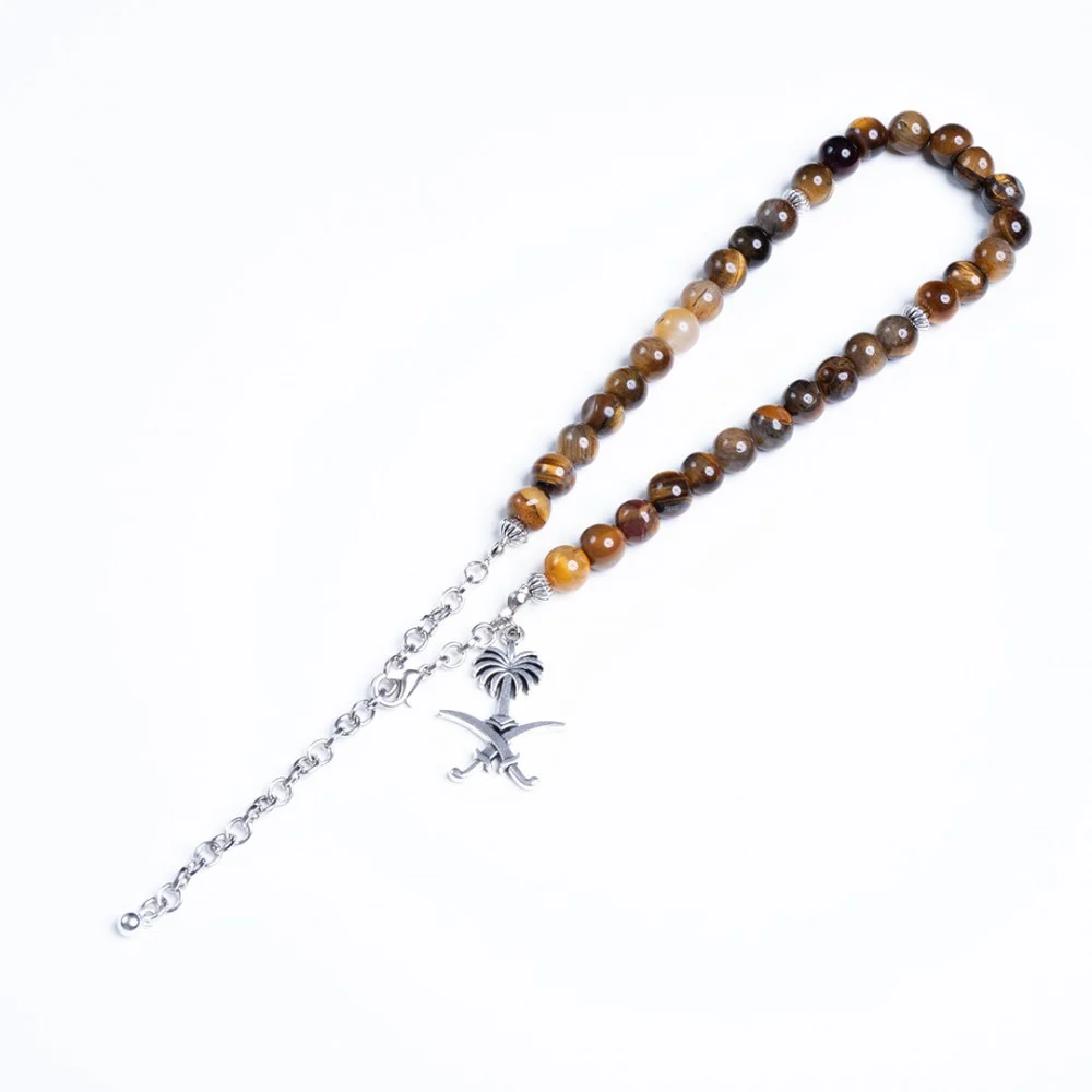 سبحة عين النمر شكل سيفين ونخلة